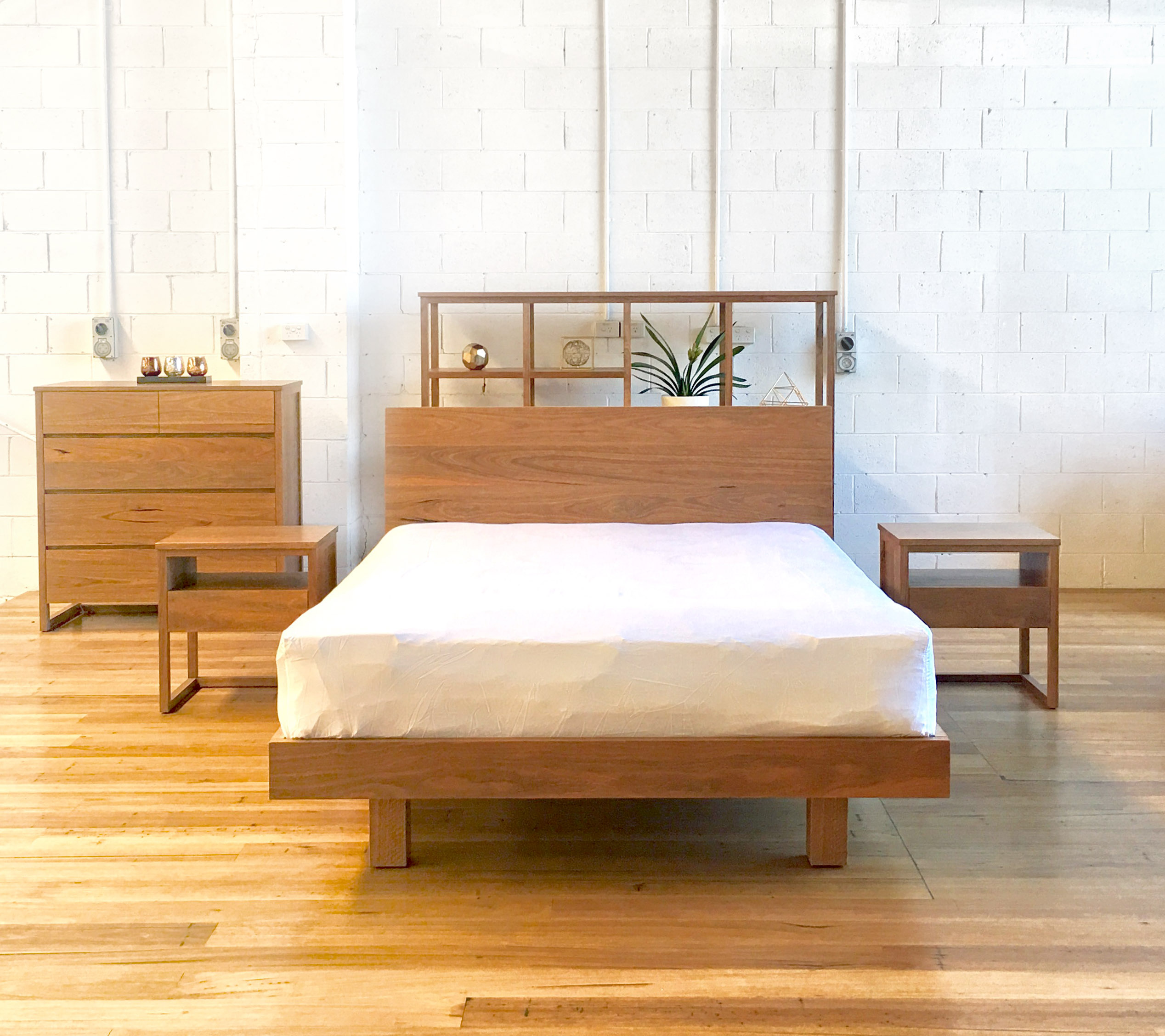 queen size bed in spotted gum bedside tables and tall boy
